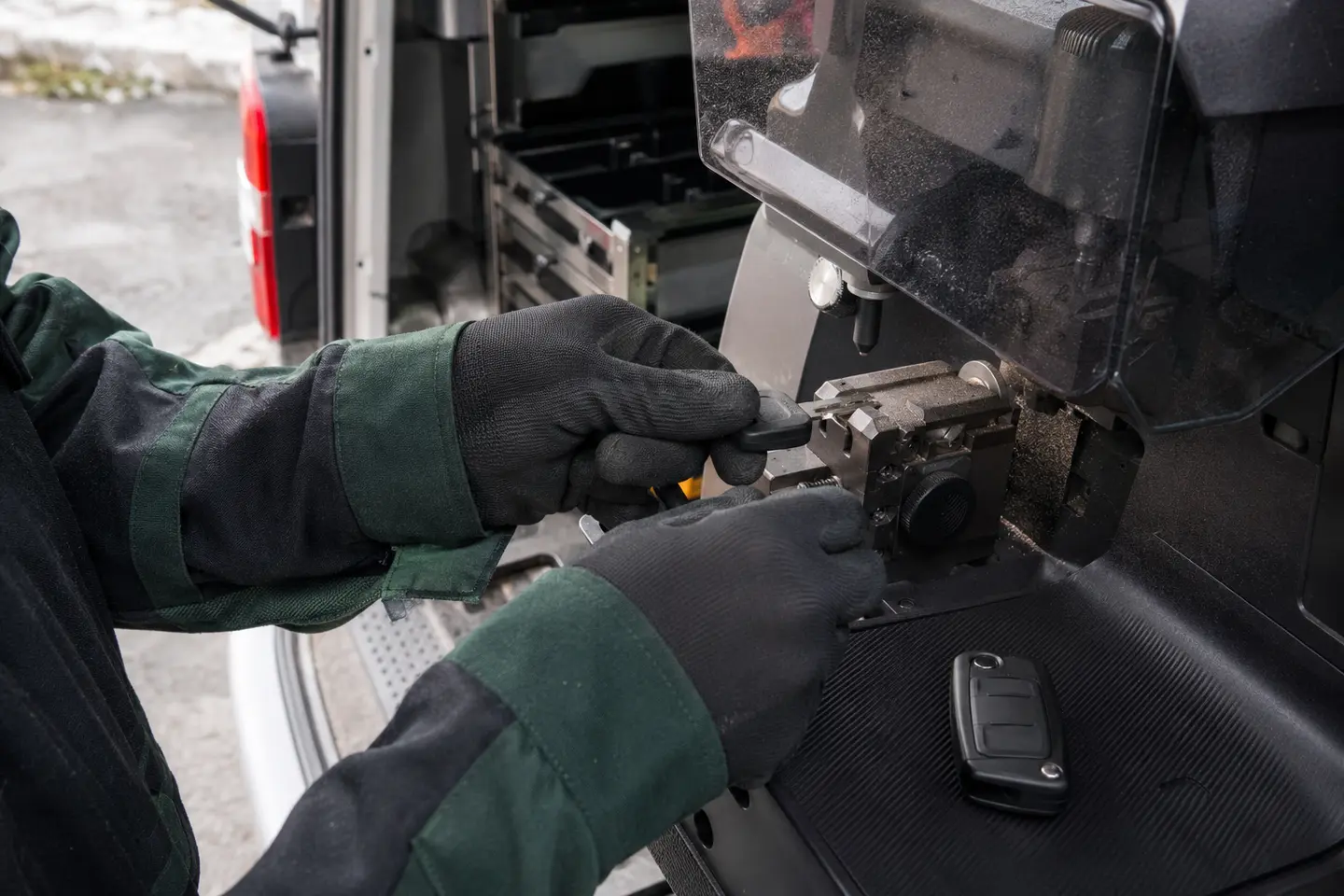Home 4 Car key being prepared in a mobile locksmith workshop