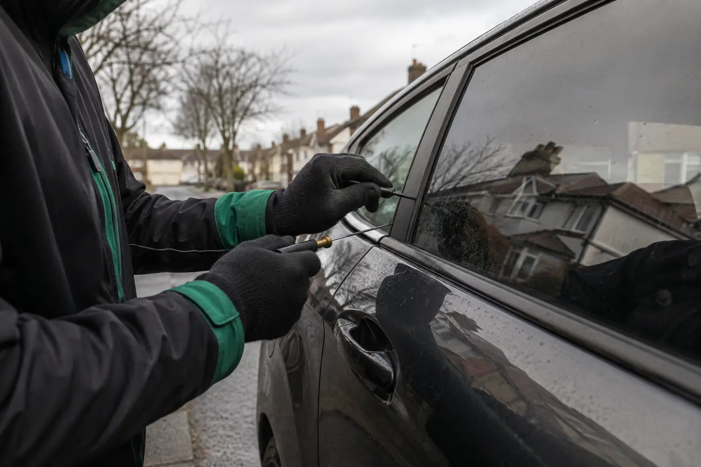Home 3 Auto locksmith assisting with a car lockout at the vehicle